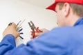 Handyman working with wires