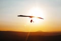 Hang-glider  flight in sky in sunset time over the .Galilean hills, Mevo Hama Royalty Free Stock Photo