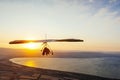 Hang-glider  flight in sky in sunset time over the Kineret, Mevo Hama Royalty Free Stock Photo