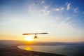 Hang-glider flight in sky in sunset time over the Kineret, Mevo Hama