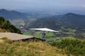 A hang glider flying in the German Alps Royalty Free Stock Photo