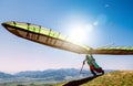 Hang glider launch from top of hill Royalty Free Stock Photo