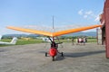 Prijedor, RS, Bosnia and Herzegovina - July 3, 2015: Orange color motor kite after flight, on sport airfield