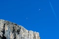 Hang glider paraglider on blue sky dolomites mountains background Royalty Free Stock Photo