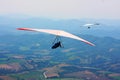 Hang glider pilot in Italian mountains