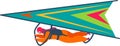 Hang glider pilot soaring through the sky, skillfully controlling the glider with hands, dressed in a vibrant orange Royalty Free Stock Photo
