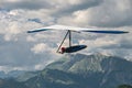 Hang glider pilot soars above Soca valley Royalty Free Stock Photo