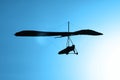 Hang-glider silhouette in sky Royalty Free Stock Photo