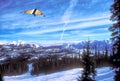 A Hang-Glider Soars Over the San Juan Mountains of Colorado Royalty Free Stock Photo