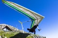 Hang glider take off in Austrian Alps. Royalty Free Stock Photo