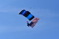 Hang gliding with the American flag Royalty Free Stock Photo