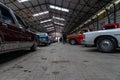 Hangar with various vintage cars of American brands