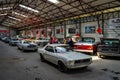 Hangar with various vintage cars of American brands