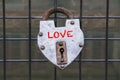 Hanged love padlock on a fence of bridge for valentines day