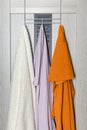 hanger on the door with towels hanging on it Royalty Free Stock Photo