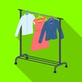 A hanger with things in the wardrobe.Making movie single icon in flat style vector symbol stock illustration web.