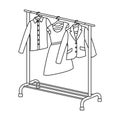 A hanger with things in the wardrobe.Making movie single icon in outline style vector symbol stock illustration web.