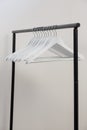 Hangers arranged on clothes rack Royalty Free Stock Photo