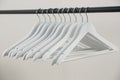 Hangers arranged on clothes rack Royalty Free Stock Photo