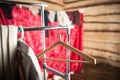 Hangers hang on the background of the wardrobe Royalty Free Stock Photo