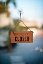 Hangging wooden sign sorry we are closed please come back again Royalty Free Stock Photo