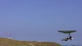 Hangglider in the blue sky