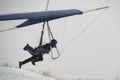 Hangglider pilot runs very fast to get airborne