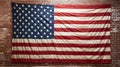 American flag hanging on red brick wall and white wall of a room. Hanging USA flag on red wall Royalty Free Stock Photo