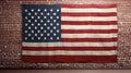 American flag hanging on red brick wall and white wall of a room. Hanging USA flag on red wall Royalty Free Stock Photo