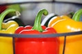 Some ripe and healthy sweet peppers with focus on the red one Royalty Free Stock Photo