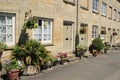 Hanging baskets in the village Cirencester in England. Royalty Free Stock Photo