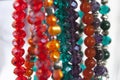 Hanging beautiful colorful bead necklaces in store