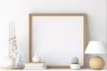 Hanging blank picture frame in modern simple home decoration Royalty Free Stock Photo