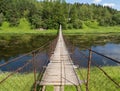 Hanging bridge goes over river