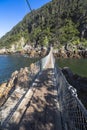 Hanging bridge over Storms River mouth, Tsitsikamma National Park Royalty Free Stock Photo