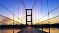 Hanging bridge under construction during beautiful sunset Royalty Free Stock Photo