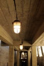 Hanging bulkhead lamp under the concrete ceiling