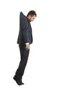 Hanging businessman looking down Royalty Free Stock Photo