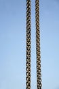 Hanging chain and blue sky Royalty Free Stock Photo