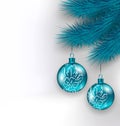 Hanging Christmas glass balls on fir twigs Royalty Free Stock Photo
