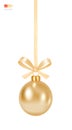 Hanging Christmas Toy with a Bow. Traditional Christmas Tree Shiny Gold Ball. Holiday Decor - golden sphere hanging on a ribbon. Royalty Free Stock Photo