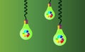 Hanging on cords three light bulbs on a green background, on them there is rainbow recycling, recycled icon, eco .Recycle a