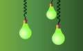 Hanging on cords three light bulbs on a green background. Vector