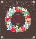 Hanging craft decoration for winter holiday with Christmas wreath, angel, redbird, jingle bell, gingerbread, cone, snowy trees and Royalty Free Stock Photo