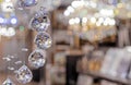 Hanging crystal balls in a modern chandelier Royalty Free Stock Photo