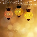 Hanging decorative lanterns glowing at night. Strings of bokeh lights. Greeting card, invitation for muslim holiday