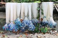 Hanging fishing net with colorful plastic floats at a fisherman village in Maluku, Indonesia Royalty Free Stock Photo