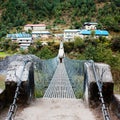 Hanging footbridge ower the marsyangdi nadi river Royalty Free Stock Photo