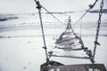 Hanging footbridge in the winter