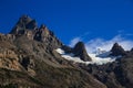 A hanging Glacier, nestled below the Granite peaks at the top of one of the mountains of the French Valley in Torres Del Paine Royalty Free Stock Photo